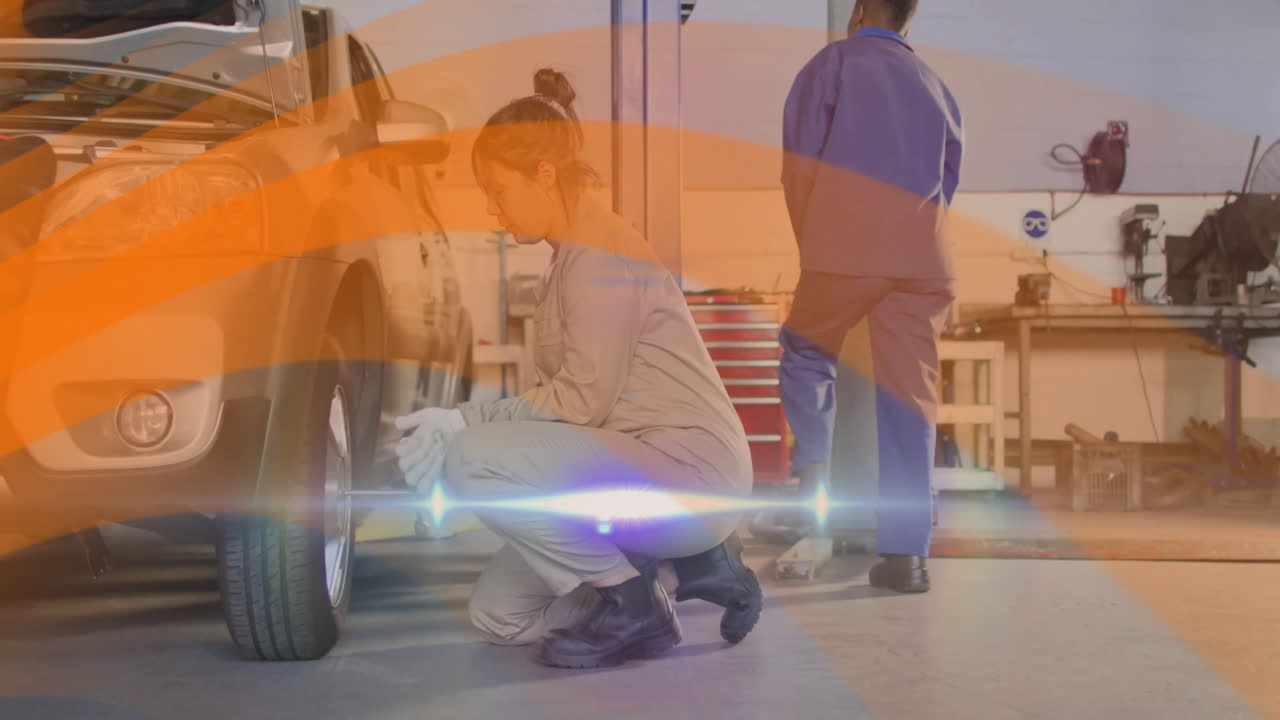female mechanic using lug wrench beside car wheel in auto repair garage, with floating tool icons
