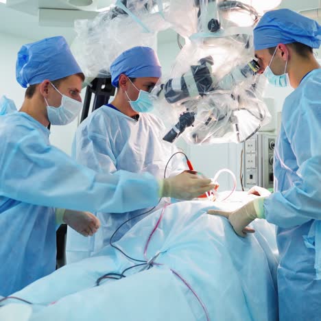 professional surgeons performing invasive surgery