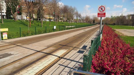 empty tram line in a city park