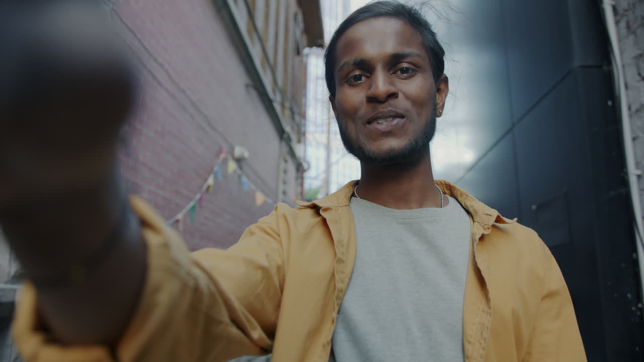 Smiling Man in an Urban Alley