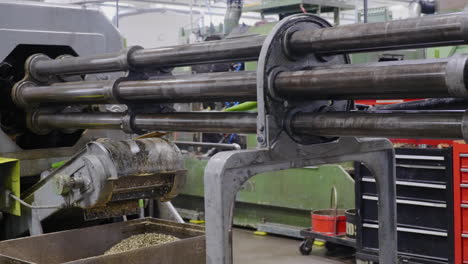 steel shavings falling from a multi spindle screw machine