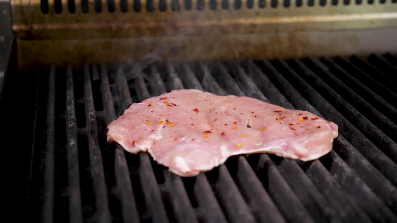 Chicken grilling on a grill