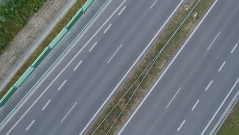 spinning drone shot over empty highway in poland