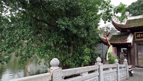 bridge leading to a traditional temple in hanoi