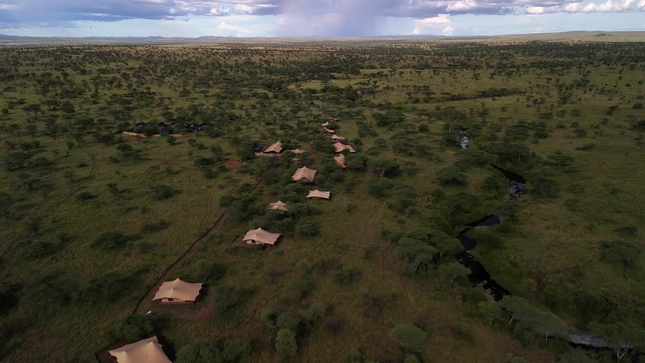 Aerial view of a small tented safari camp in the Serengeti National Park in Tanzania during daytime