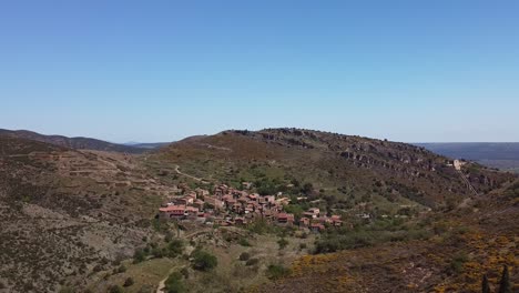 beautiful landscape filmed with mini drone flying around a medieval village in spain close to madrid