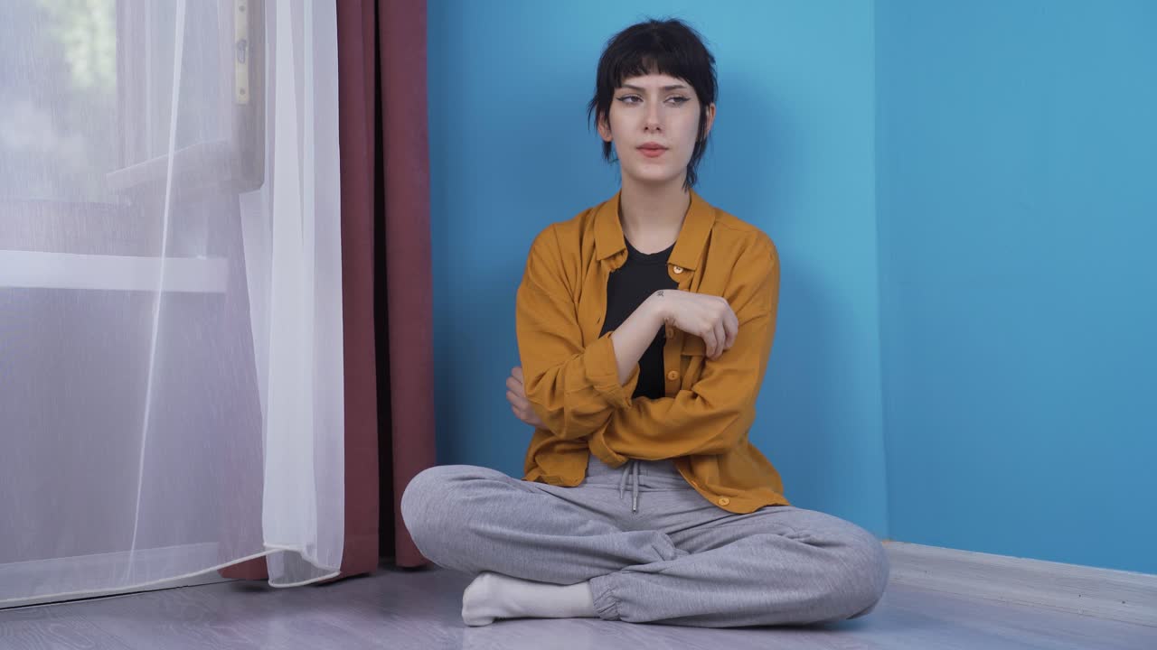 Stressed young woman, tense state.