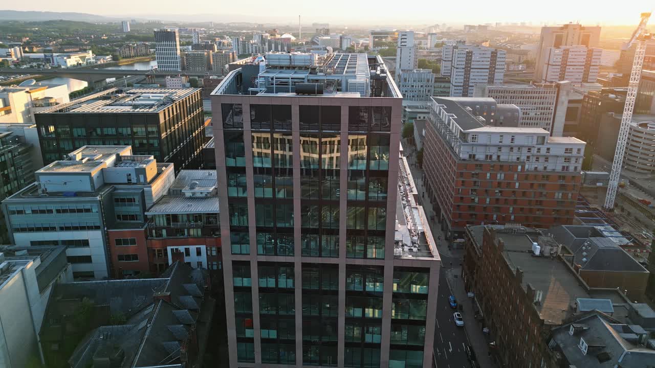 A 180-degree pan at sunset of Glasgow's new office building located on Argyle Street, near Glasgow Central Station
