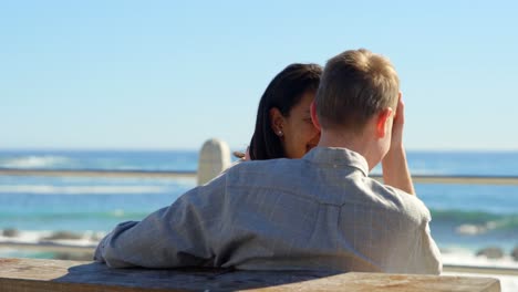 couple talking with each other near railing 4k