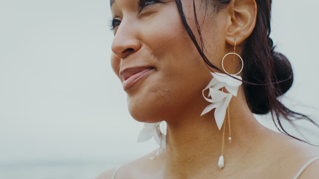 Portrait of a beautiful woman with elegant earrings