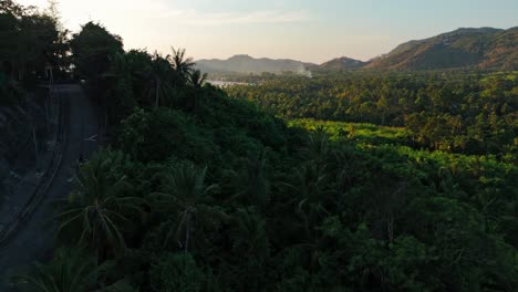 Curve-road-on-forest-side-with-hills-on-it-sides