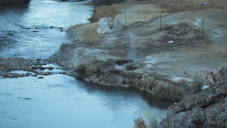 Steamy-Boiling-Hot-Spring-and-Shoreline,-Hot-Creek-Geological-Site,-California,-High-Angle