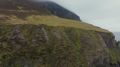 Revealing-drone-shot-of-the-beautiful-high-cliffs-near-Keel-on-Achill-Island