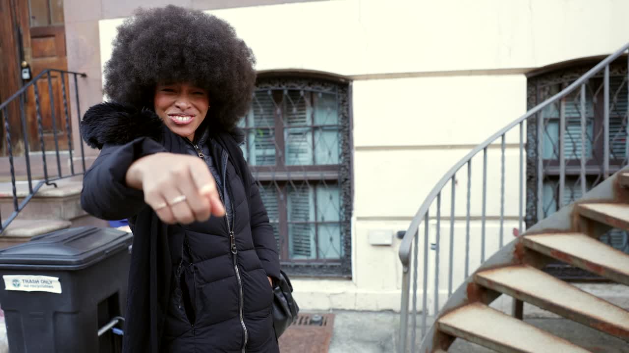 Woman with Afro on Stairs