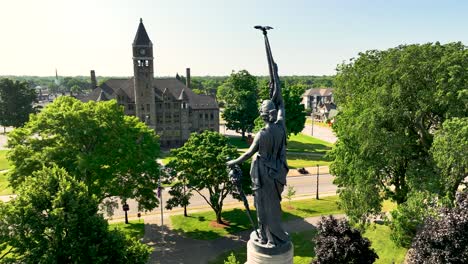 close still look at the statue and the administration building in the distance