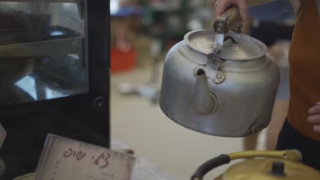 masala chai poured from pot