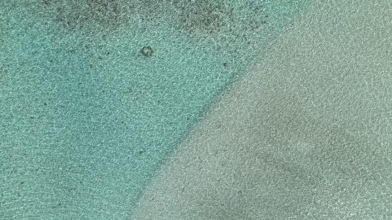Aerial Drone View of Coral Reef and Turquoise Lagoon in Maldives