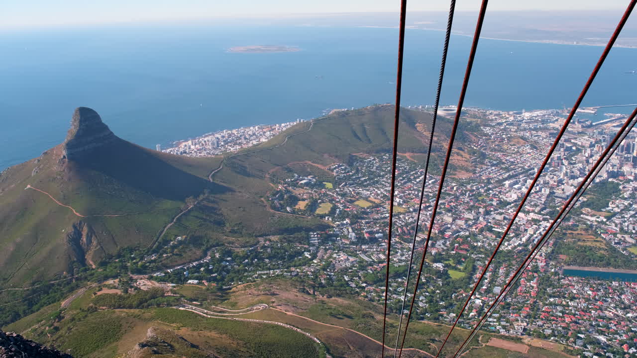 POV from cable car on Table Mountain of Lion's Head and Signal Hill, Cape Town