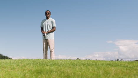 african american man on the golf course.