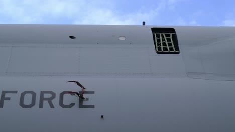 detail of c-5 galaxy left fuselage with open hatch and pitot probes