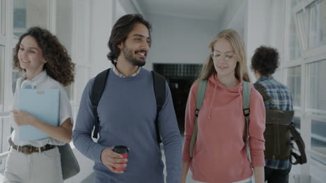 students walking in a university corridor