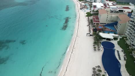 beachfront hotel with swimming pool in cancun, mexico