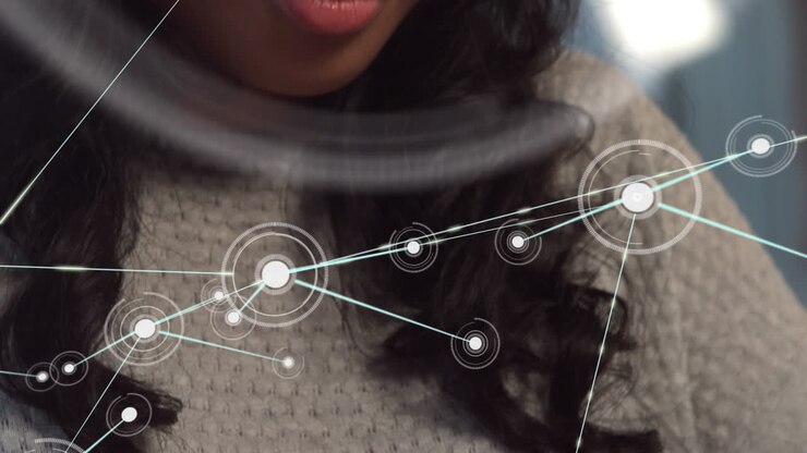 Animation of dots connected with lines over asian businesswoman working on digital tablet