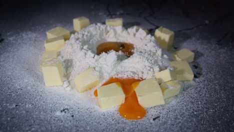 dropping egg into the flour slow motion