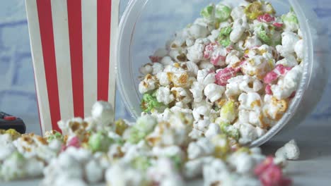 colorful popcorn in a bowl and box