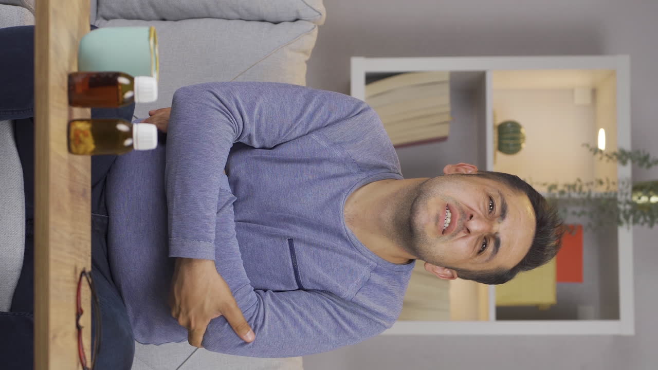 Vertical video of Man with elbow pain.