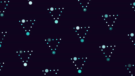 triangular green dot pattern on a black background