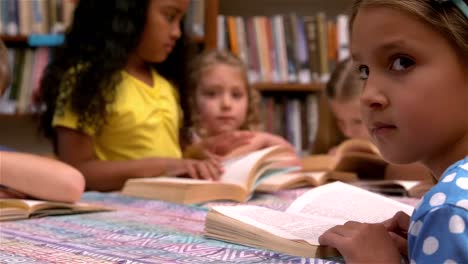 Young-class-reading-books-in-the-library