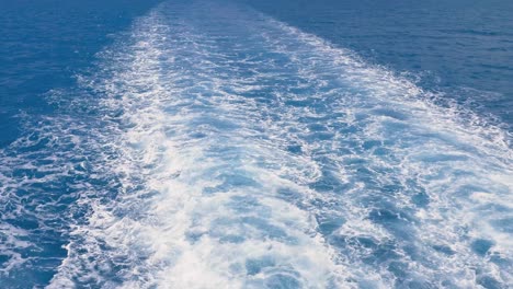 A-slow-motion-view-of-the-wake-behind-a-large-ferry-in-the-sea