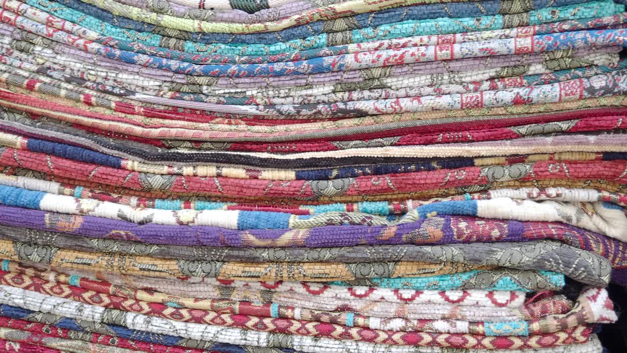 Stack of Colorful Patterned Textiles