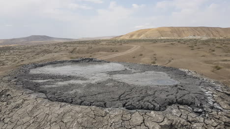 close up of active mud volcano in desert landscape of gobustan national park, azerbaijan