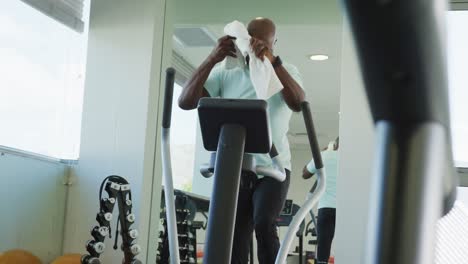 video of senior african american men is exercising at the gym