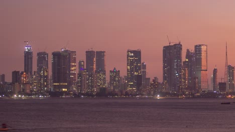 timelapse of dusk falling over mumbai skyscrapers