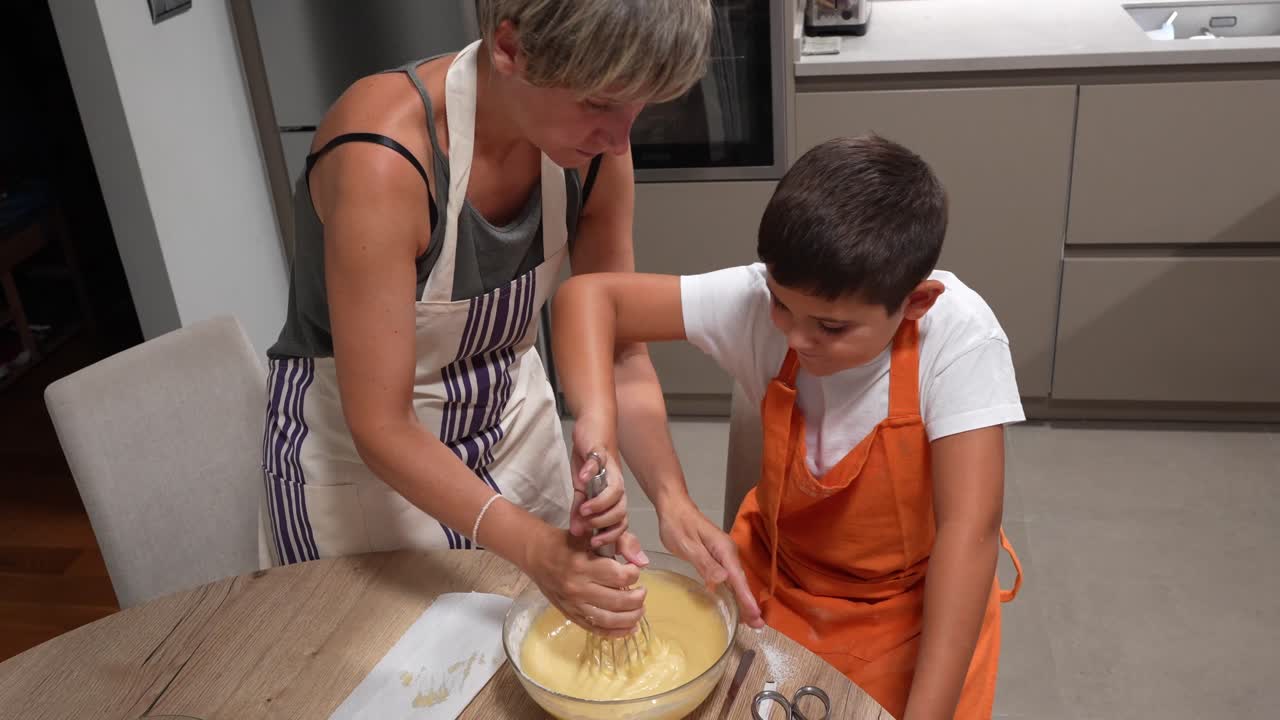 People Cooking Together in Kitchen