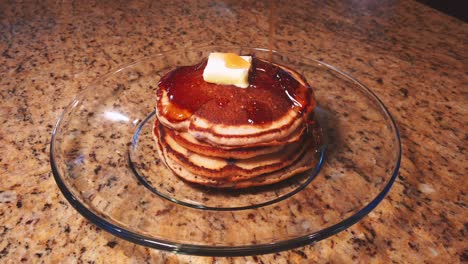 static shot, stack of pancakes, melting butter, pouring syrup on top, los angeles, california, usa