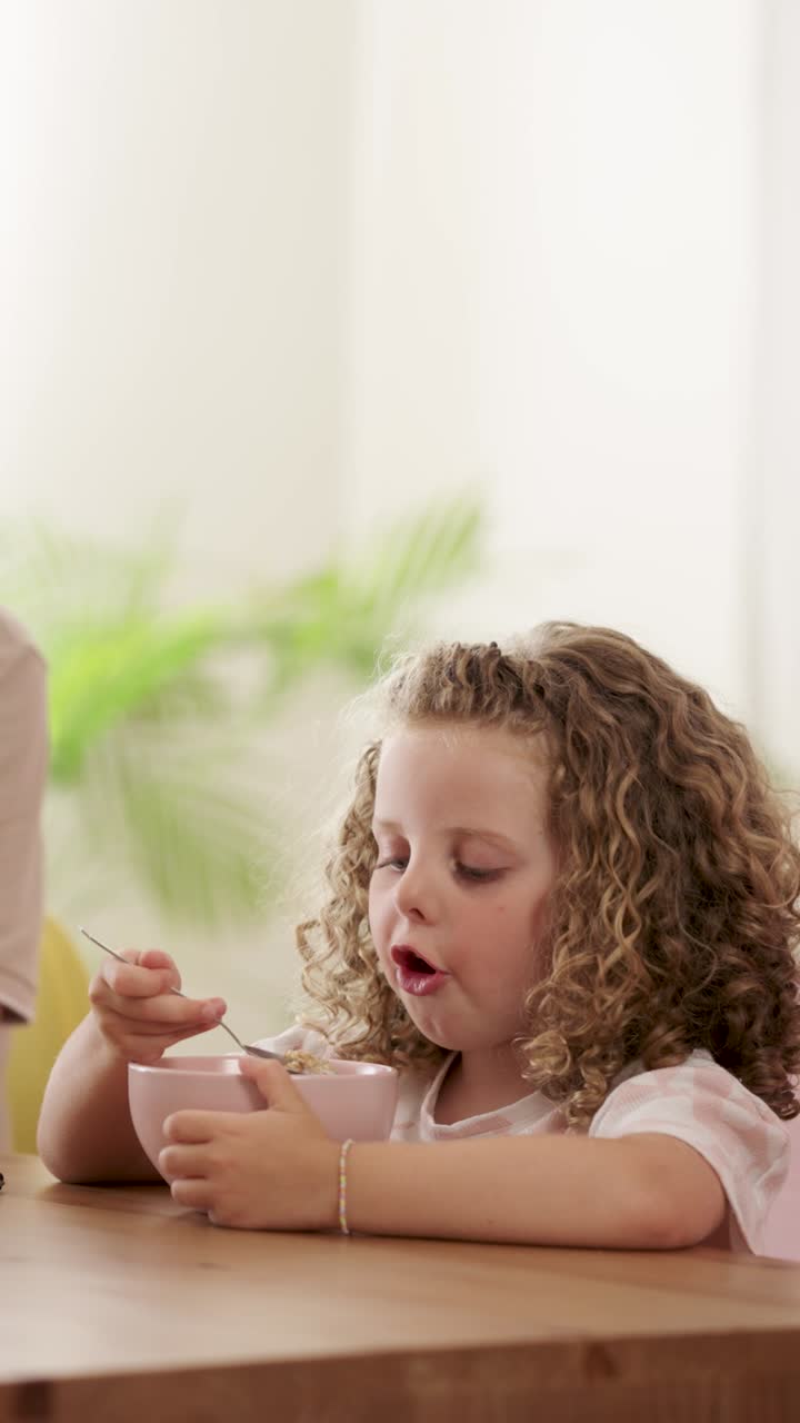 Girl eating breakfast