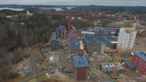 an aerial view of a new neighborhood is being built up next to a forest