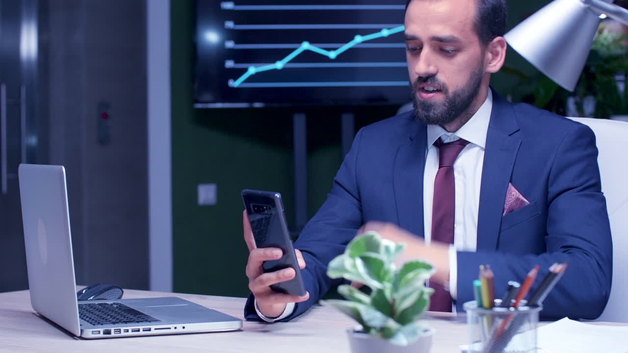 Businessman using a smartphone in the office