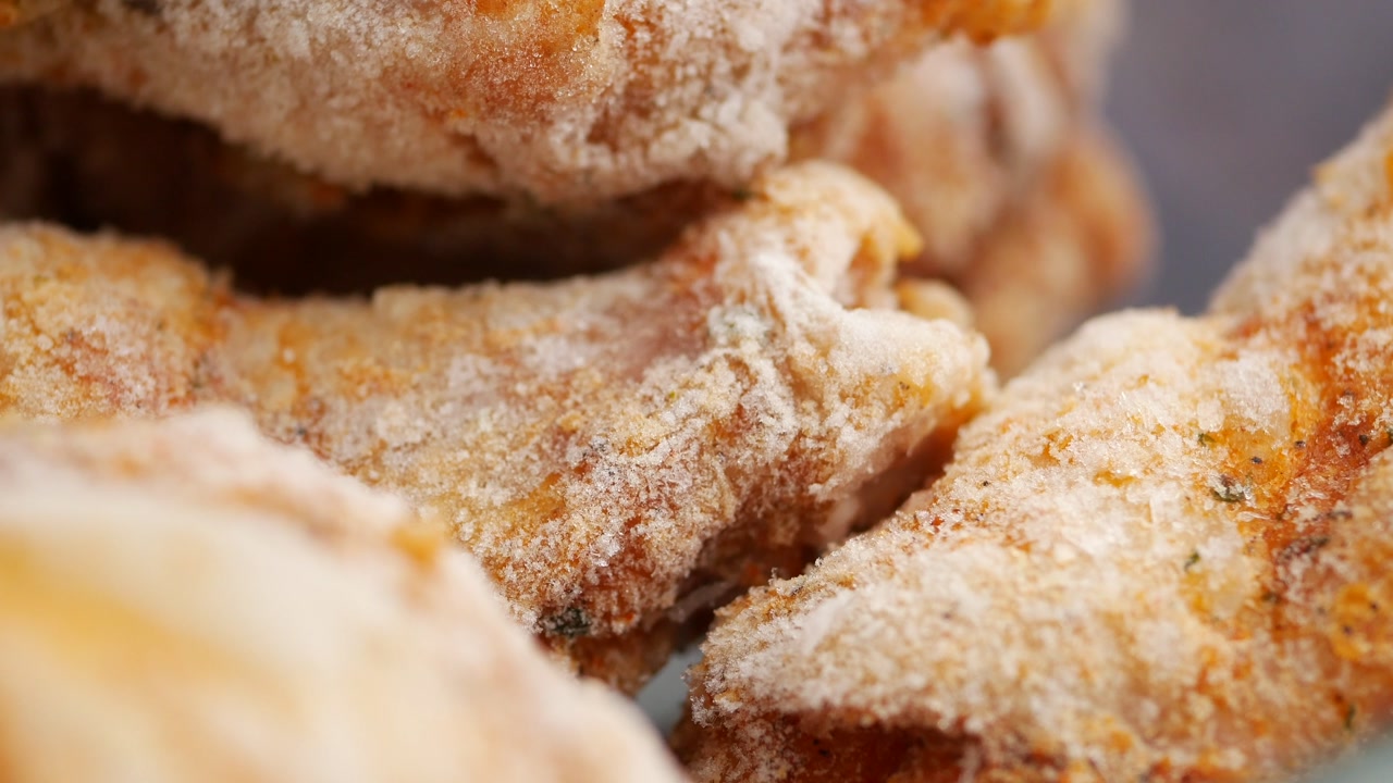 Close-Up of Frozen Breaded Chicken Wings