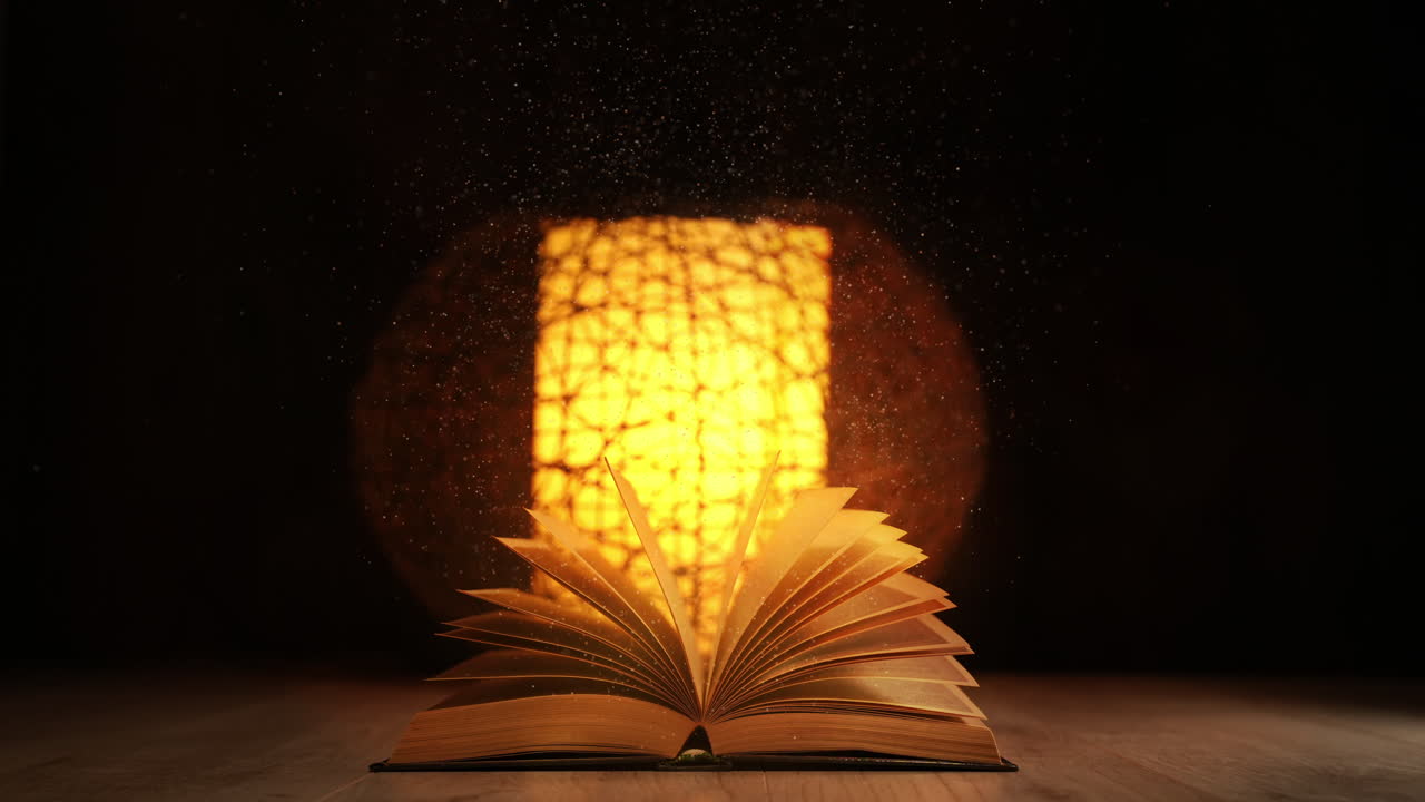 Opened old book on a wooden table against the background of a bright yellow magic lamp. Flying particles. Looped animation.
