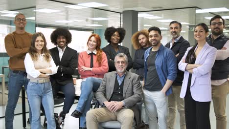 group of cheerful multiethnic businesspeople standing in office
