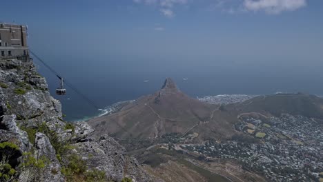 cable transport aerial drone view at south african table mouintain viewpoint landscape, flying panoramic