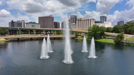 downtown orlando cityscape with lake eola fountains