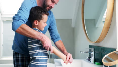 Washing-hands,-bathroom-and-a-father