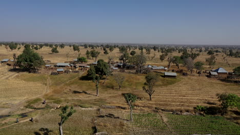 farming village in africa during a drought year in the dry season - aerial view of the arid landscape