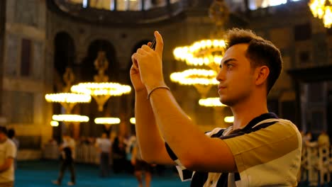 Man-taking-pictures-inside-Hagia-Sophia